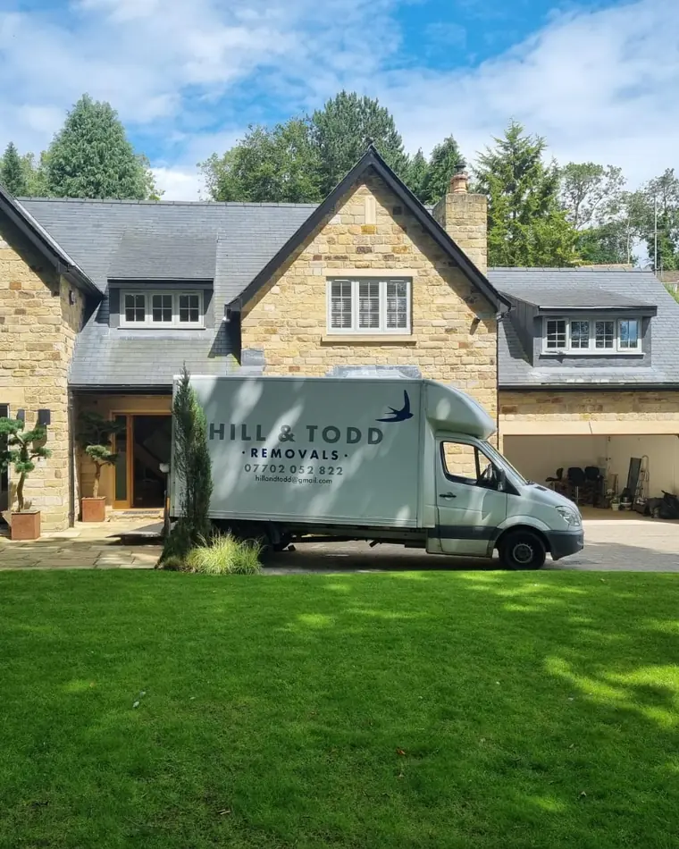 Hill & Todd Removals van on a job